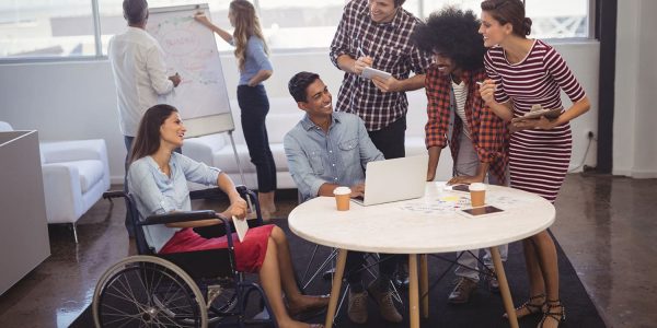 Happy business people discussing strategies