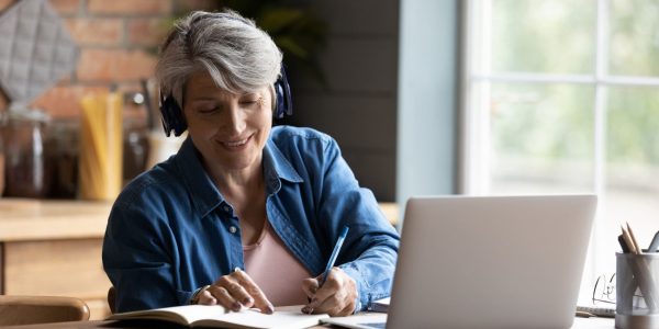 Modern,Elderly,Grey-haired,60s,Woman,In,Headphones,Take,Online,Course