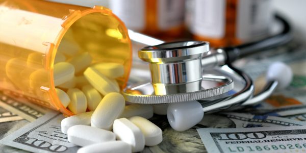 Stethoscope,Laying,On,Medicine,White,Pills,Money,With,Rx,Prescription