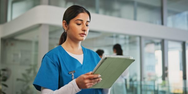 Nurse,,Woman,Or,Reading,With,Tablet,In,Hospital,,Healthcare,Platform